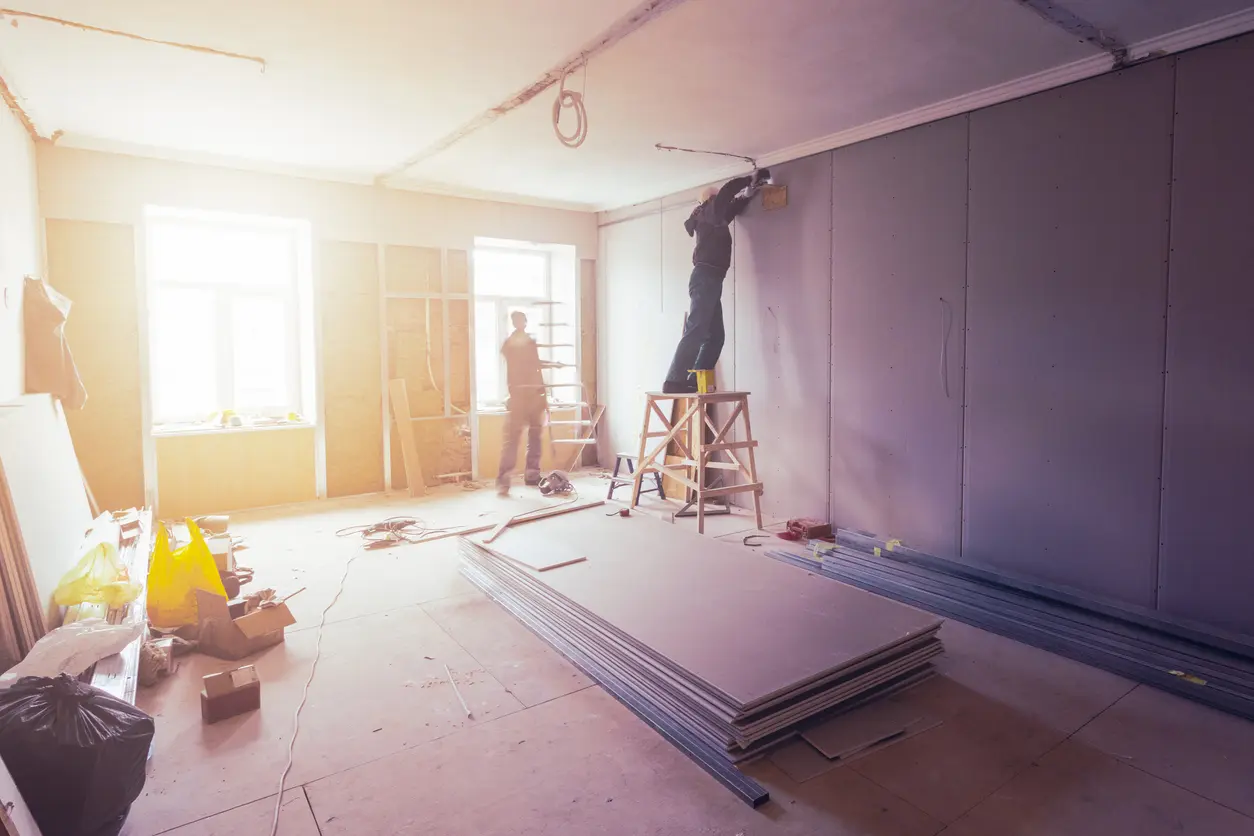 Contractors restoring interior walls during a Prescott AZ home restoration project
