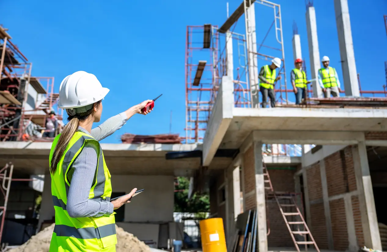 Construction manager overseeing new home construction in Prescott AZ