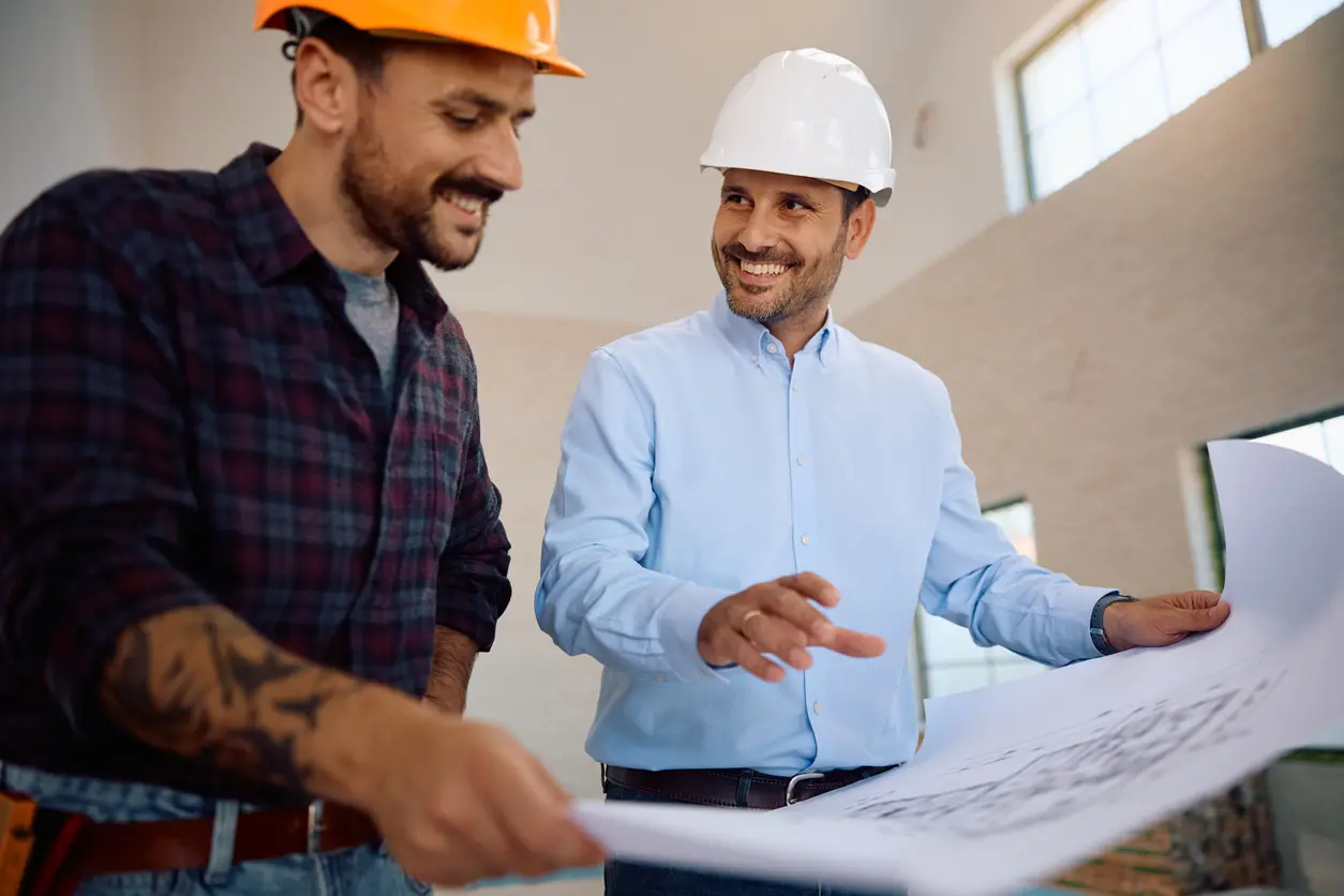 Contractor discussing value engineering plans with homeowner in Prescott AZ