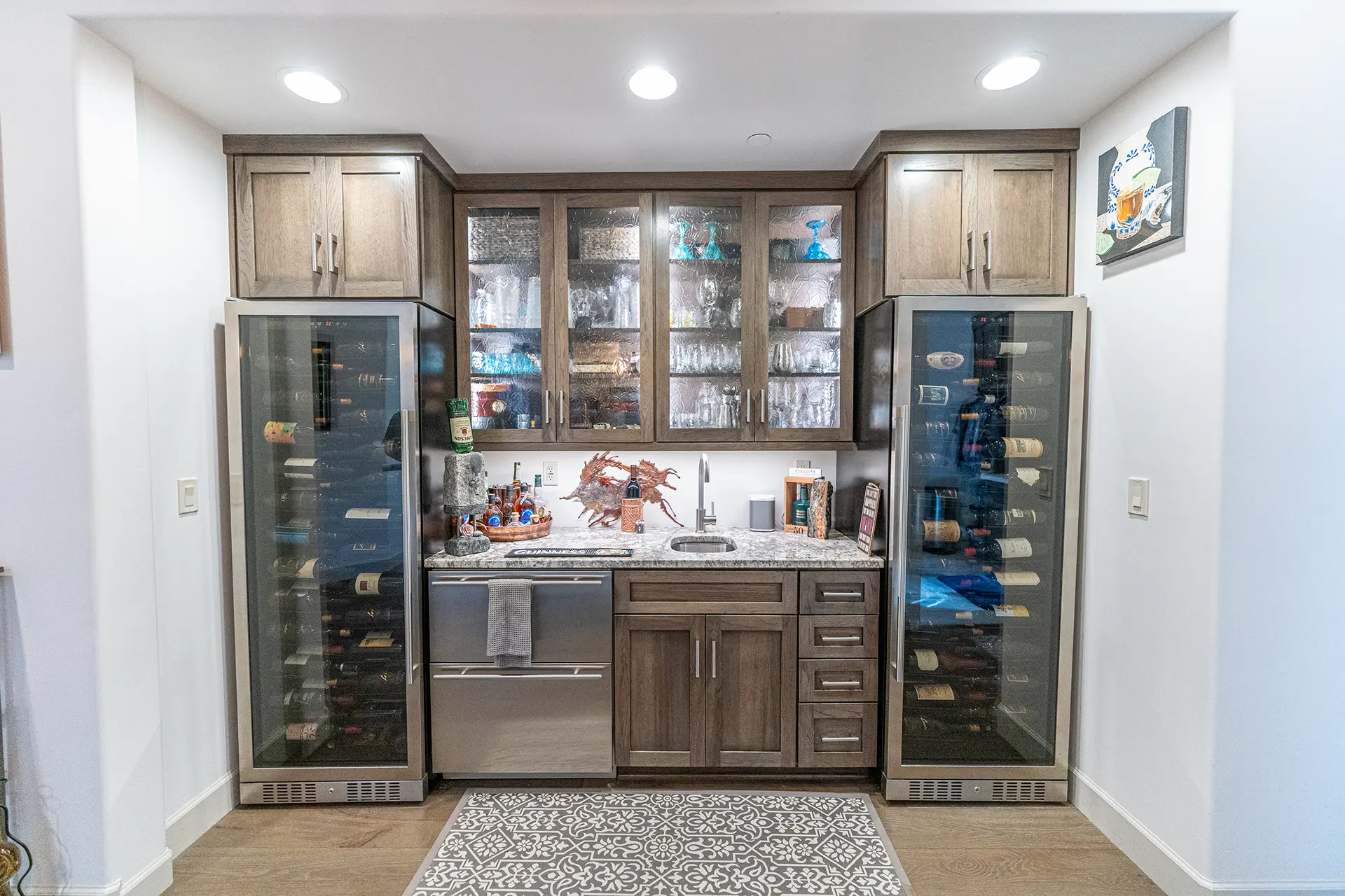 Custom Home Bar Prescott Custom home beverage station built by a custom home builder in Prescott with storage and wine refrigeration Description Custom features like this beverage center add value and personality to homes built by a custom home builder in Prescott. Prescott Builders of AZ provides personalized custom home construction throughout Prescott, AZ.