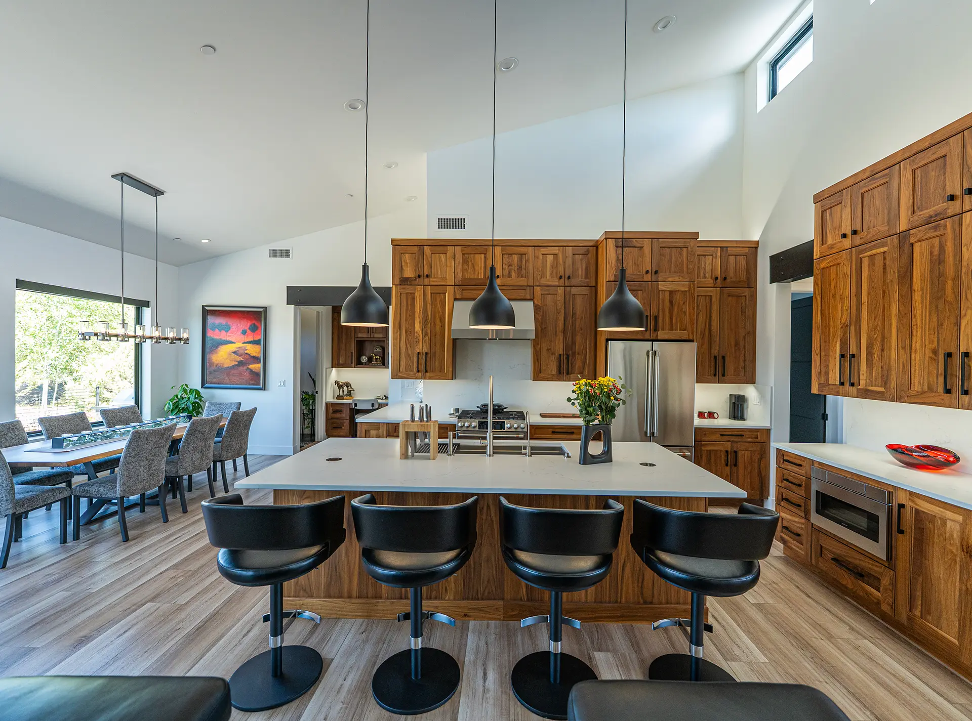 Luxury kitchen designed by a custom home builder in Prescott with custom cabinetry and oversized island