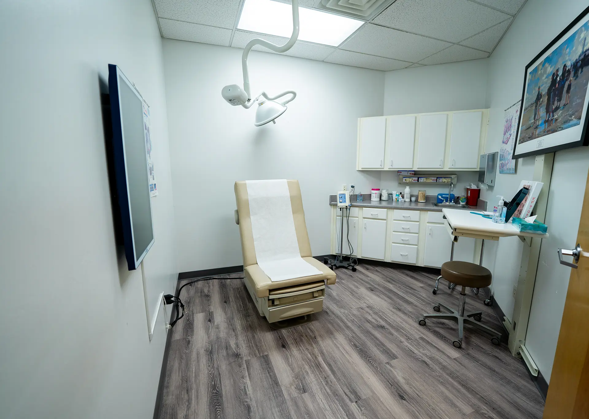 Healthcare Examination Room Prescott AZ Healthcare examination room built by a custom home builder in Prescott AZ featuring modern finishes and medical workspace