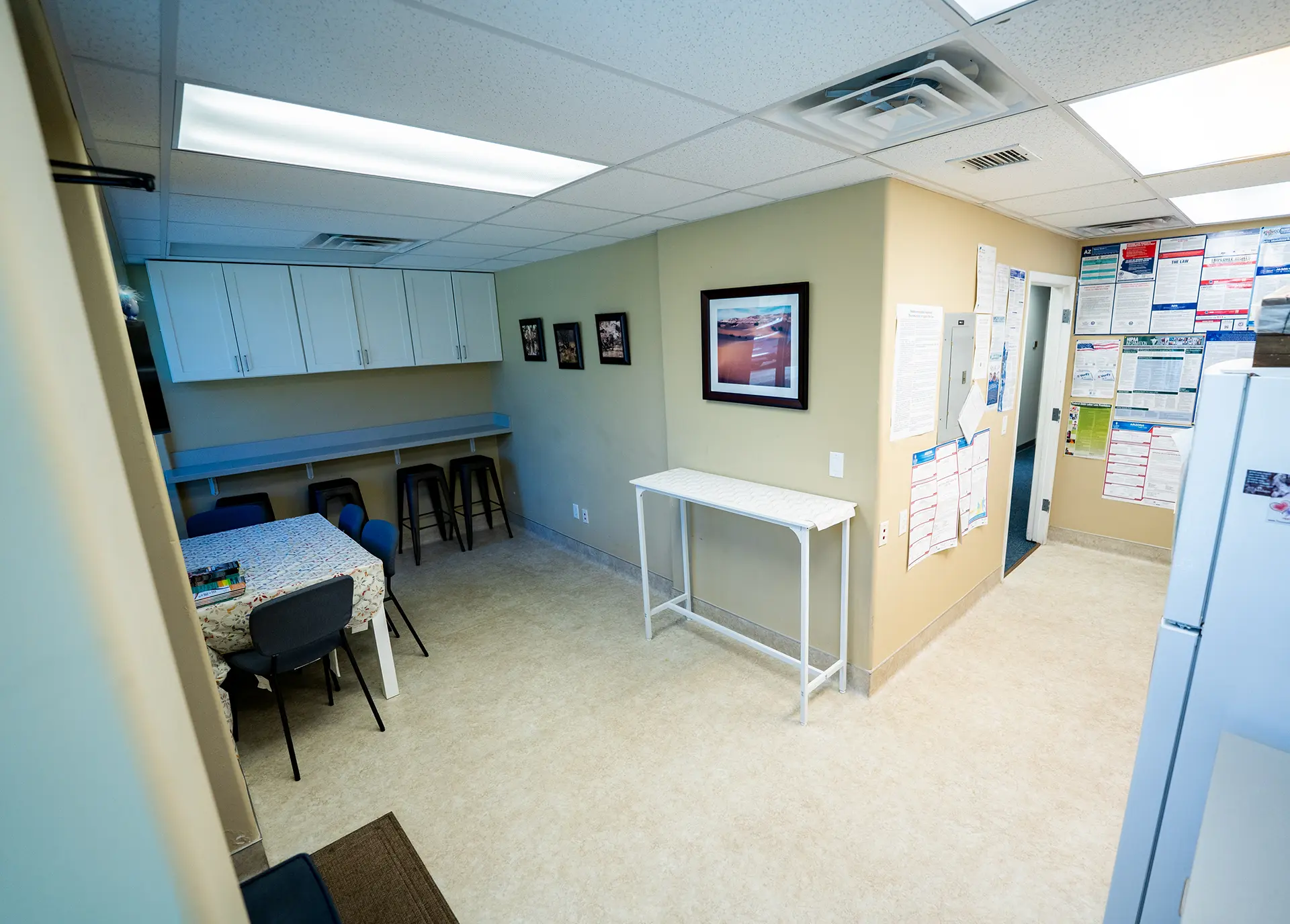 Medical Staff Break Room Prescott AZ Medical staff break room designed by a custom home builder in Prescott AZ with dining area and cabinetry