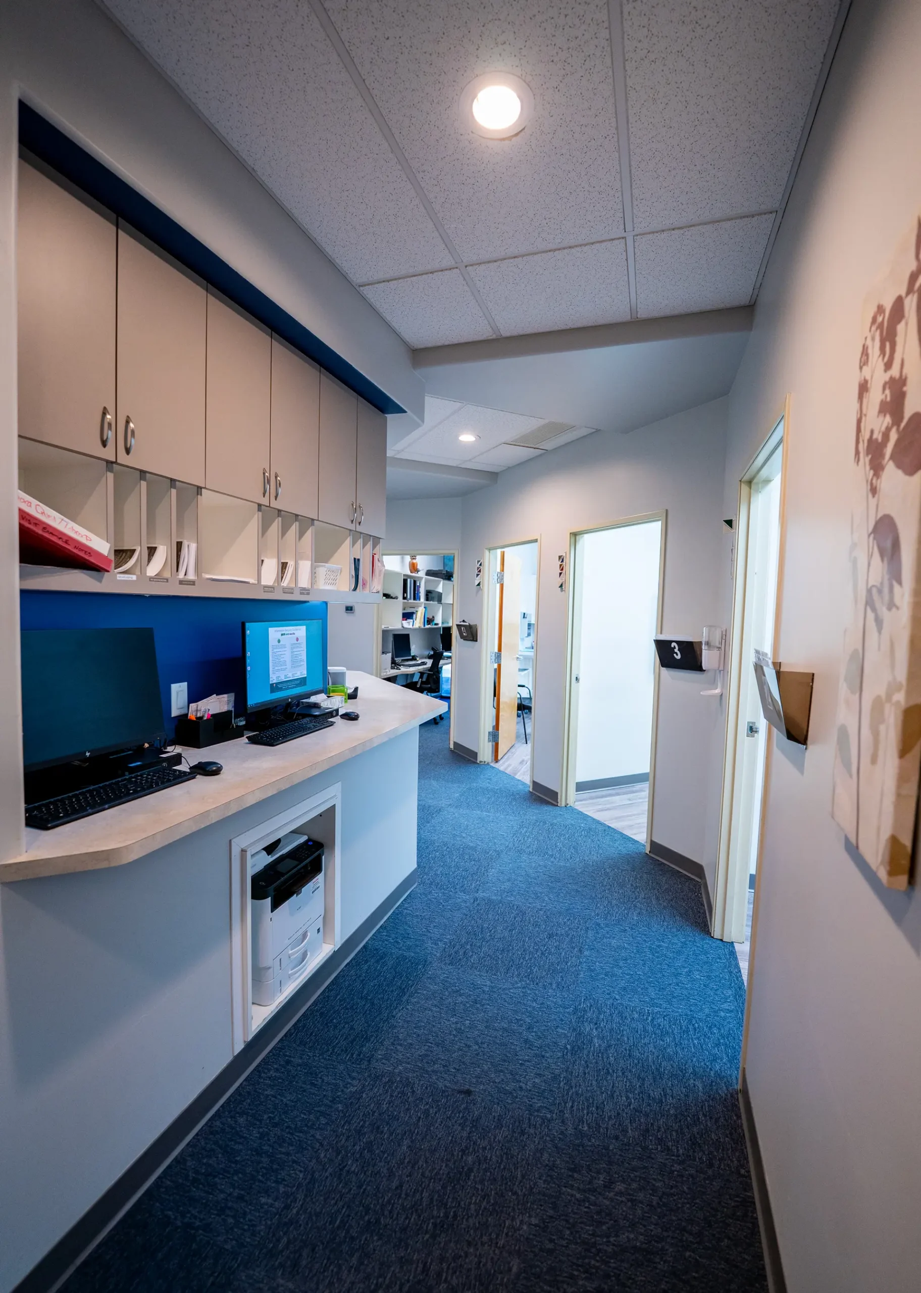 Medical Staff Workstation Prescott AZ Medical staff workstation built by a custom home builder in Prescott AZ with integrated cabinetry and workspace