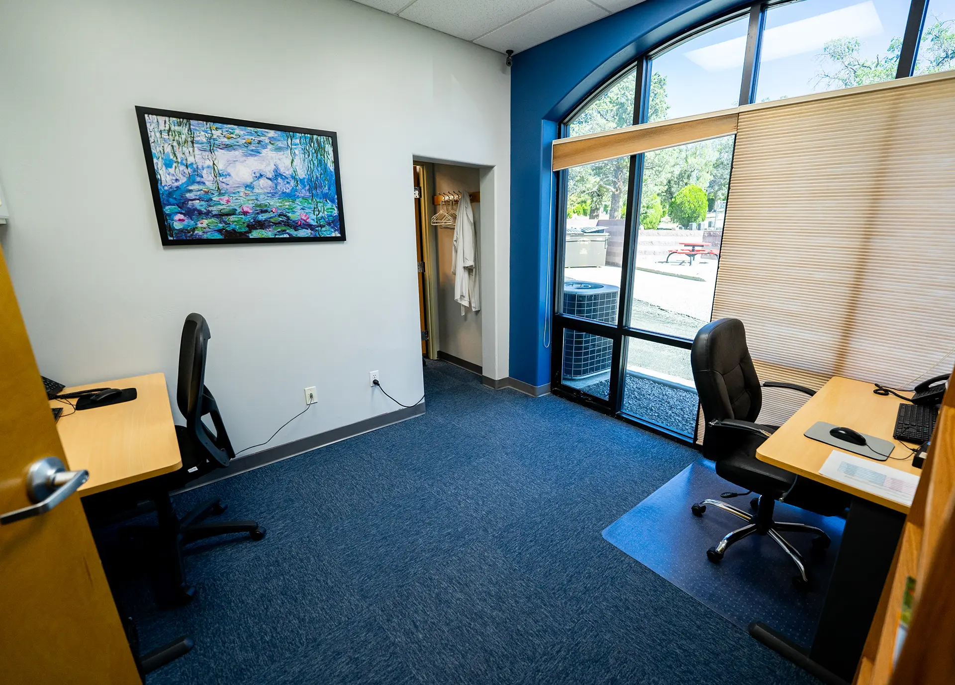 Physician Consultation Office Prescott AZ Physician consultation office by a custom home builder in Prescott AZ featuring workspace and large windows Physician consultation office by a custom home builder in Prescott AZ featuring workspace and large windows